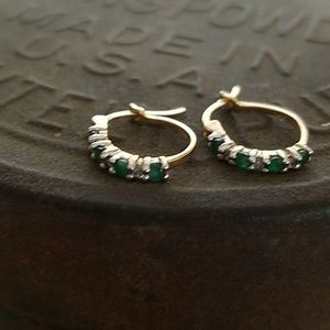 Emerald diamond and gold earrings.